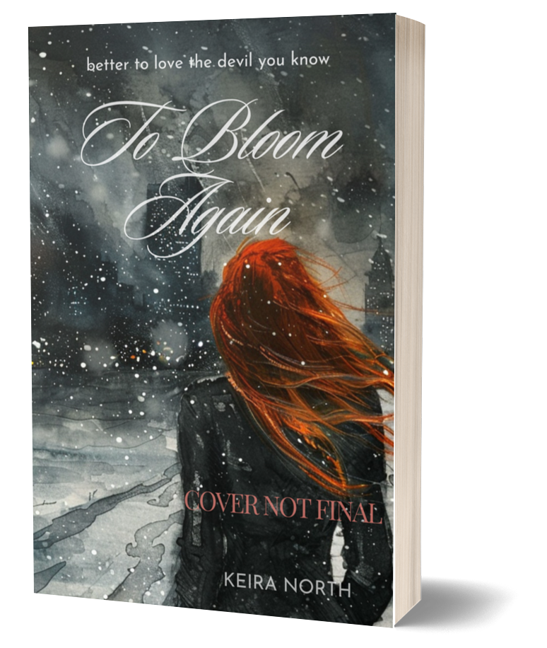 Cover of the book titled To Bloom Again by Keira North, featuring a woman with long red hair standing with her back to the viewer in a snowy landscape. The sky is dark, filled with snowflakes. The Seattle skyline is visible in the distance. The text on the cover reads, Better to love the devil you know, at the top, with the title in elegant script in the center. The words COVER NOT FINAL are displayed across the lower portion of the image, indicating this is a preliminary design.